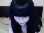 RAVEN HAIRED CUTIE JUST SORTA SITS THERE