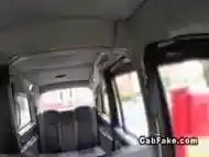 Busty blonde Brit gives footjob in fake cab