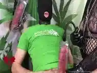 420 Goth MILF handjob in black latex gloves with penis pump. Alternate view.