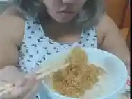 Cute feedee eats noodles for her feeder