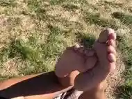 Foot play on nude beach with dick flash