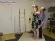 Girl on tiptoes with crotch rope