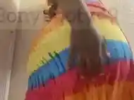 Girl ripping nasty bubbly farts in rainbow dress