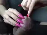 Long red nails play with peehole