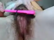 Mega Hairy Pink Pussy Camgirl Brushes Her Big Giant Pubic Bush Pubes with Bristle Brush Innocently