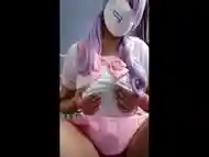 Naughty schoolgirl playing with her tits