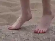 Outdoors foot play on the beach