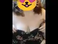 Redhead plays with huge tits