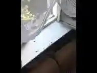 Russian boy jerking off in front of the window