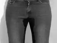 Slim MILF pisses in jeans.