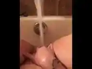 Teen cums from putting pussy under faucet