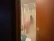 Teen redhead riding dildo in shower home alone