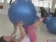 Teenager with exercise balls