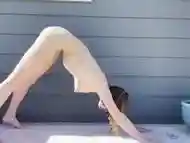 morning outdoor nude yoga - yoga with grey