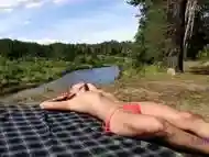 risky public nudity in nature sunbathing topless everybody sees