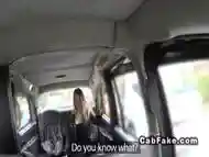 Busty blonde Brit gives footjob in fake cab