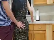 Voluptuous mommy is banged by her randy stepson in the kitchen while making dinner