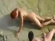 Beach couple sex play