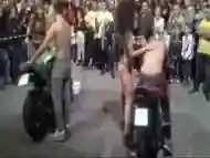 Bike washing competition with sexy babes in swimsuits