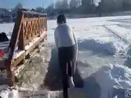 Brave Russian bimbo strips down to her underwear in snow