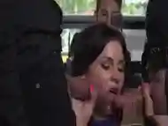 Brunette sucking dicks in public