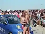 Busty babes put on sexy carwash show for an audience