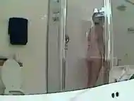 Chubby girl spied in a thorough shower