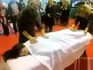 Double massage in public of an Asian bikini girl