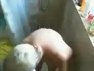 Jerk off on busty mature woman while she showers