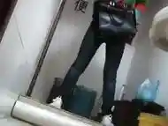 Nerdy chinese girl caught taking a leak