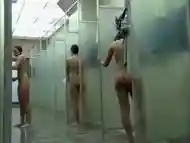 Young ladies enjoy washing their bodies in the public shower