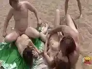 Amateur swingers are having sex at the beach