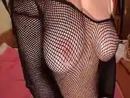 Britney Fucked in a Crotchless Nylons Catsuit before getting her Big Natural Tits jizzed-on right through the Nylon mesh.