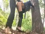 Girl in a leather jacket and leggings fucks in the park in public