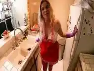 Stepmom in the kitchen helps stepson with his boner