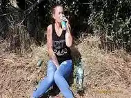 Wetting her panties outdoor - Pissing herself while talking with her boyfriend on the phone