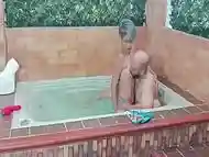 While I play in the jacuzzi my stepson comes to fuck me and fill me with his delicious semen