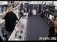 Amazing young woman is having sex in shop with dude