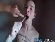 Bottom bitch twink gets mouth fucked hard by three big dicks