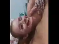 Passing the tongue on the head of the dick slowly and sucking with desire