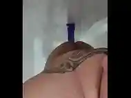 YoungChub rides his purple dildo in the shower