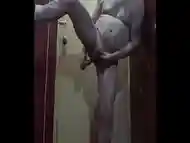 bisexual naked male standing with a dildo in his ass self fucking himself till he makes himself shot a load on the floor