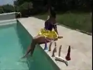 Bombastic little bitch does a fetish cosplay by the pool