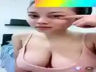 Asian babe showing off her big amazing tits LIVE