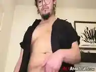 Chubby punk rocker jerks off his fat cock and cums in hands