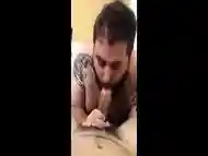 Hairy bear sucking huge cock