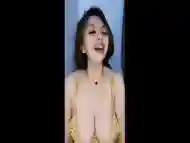 Indonesian Young MILF Showing Off Her Huge Tits LIVE