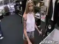 Inked chick bounces on a big dick for some money in pawnshop