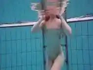 Pretty Polish teen Alice swimming without clothes on