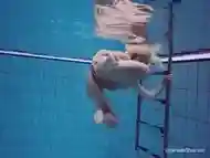 Russian blonde perfection swimming in the pool